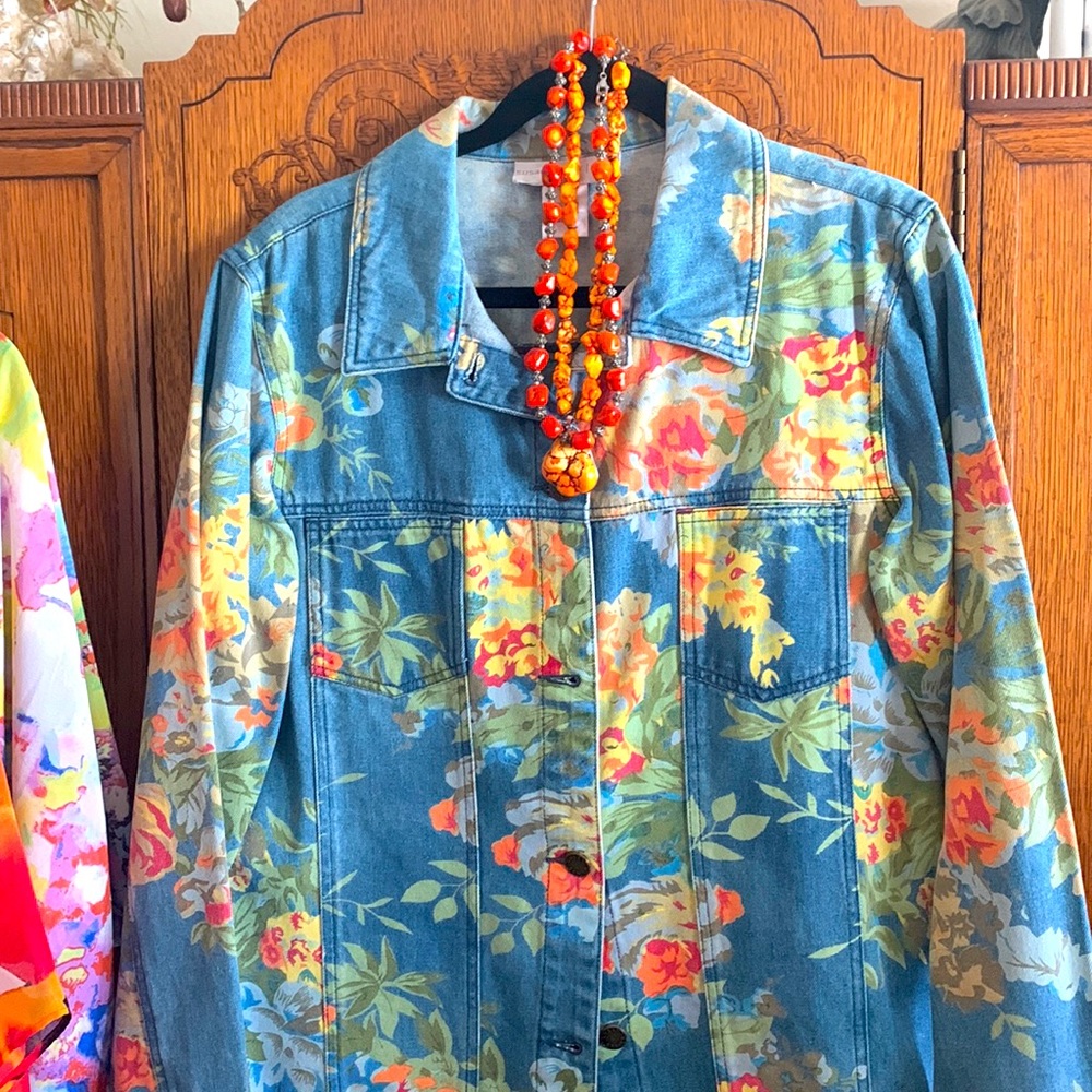 Beautiful floral Jean jacket. Orange yellow and green colors